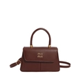 Deep brown leather top handle crossbody bag with gold metal logo and trapezoidal design - Brown