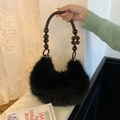 Black faux fur hobo bag with unique wooden beaded handle in a bohemian style - Black