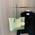Light green matte faux leather tote bag with a pink peach charm and SWEET ribbon - Green
