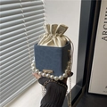 Blue matte small square bag with pearl handle and golden chain for a minimalist chic look - Blue