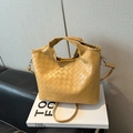 Chic yellow woven tote bag with top handles and adjustable strap on a white book base - Khaki (No Pendant)