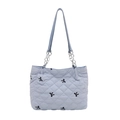 Borsa tote trapuntata celeste con ricami a fiocco neri e dettagli in catena argento - Blu