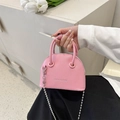 Pink lychee texture mini shell bag with silver chain strap for elegant crossbody use - Pink