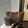 Detail view of large capacity tote bag with matching zipper pouch in brown pattern - Coffee