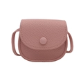 Mini pink litchi texture saddle bag with round flap and crossbody strap on white background - Pink