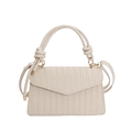 Minimalist beige woven square handbag with a unique knot handle and gold hardware - White