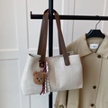 Off-white canvas tote bag with brown leather strap and plush bear pendant detail - With Ornament / Brown