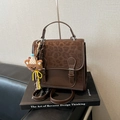 Brown vintage handbag with leopard print flap and cute bear pendant accessory - Coffee with Charm