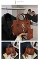 Brown crocodile pattern women's handbag with gold S-buckle and matching small wallet - Brown