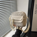 Minimalist beige corduroy crossbody bag with adjustable strap and front pocket - White