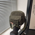 Olive green corduroy crossbody bag with adjustable wide strap and vintage casual style - Green