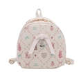Linda mochila color crema con patrones de dibujos animados pastel y un gran lazo - Blanco