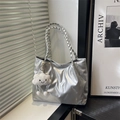 Silver metallic tote bag with woven handles and a cute cloud charm on a white surface - With Pendant / Silver