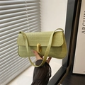 Green crocodile embossed baguette shoulder bag with gold hardware buckle and minimalist design - Green