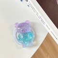 Dettaglio del supporto per telefono a forma di orso con paillettes viola e verde acqua - Magnetico - Paillettes Arcobaleno - Sfumatura Viola
