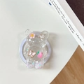 Macro detail of bear-shaped phone grip with colorful glitter and resin floral inserts - Magnetic - Bear - Sequins Daisy Strawberry Butterfly - Pink
