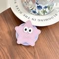 Support téléphone étoile rose brodé Smile sur table en bois avec décor céramique - Violet
