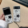 Detail of Galaxy Z Flip case featuring glitter stars and hearts on clear TPU texture - Matte Hard Shell - Meteor Glitter - Black Silver Star / Samsung ZFlip3