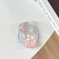 Macro detail of cute bear-shaped phone grip with pink strawberry sequins and glitter - Magnetic - Starry Sky Strawberry Bear