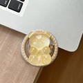 Macro detail of amber glitter bear phone grip with pearl border on laptop surface - Magnetic Pearl Glitter Bear-Yellow