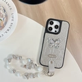 Detail of silver crinkled leather case with rhinestone butterfly and luxury beaded strap - Large Hole Pearl Pattern - Silver Butterfly Logo - White Pearl Chain - Silver / iPhone 17 Pro Max
