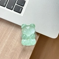 Macro shot of mint green bear phone grip with glitter resin texture on wooden desk - Adhesive Pop Grip Glitter Bear-Green