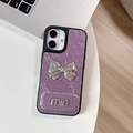 Detail of purple pleated leather case with silver bow and metallic logo for iPhone - Large-hole Pearlescent Texture - Matching Mirror Stand - Mini Bow - Purple / iPhone 17 Pro Max