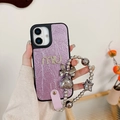 Detail of purple pleated leather iPhone case with diamond letters and star charm chain - Pearlescent Rhinestone Letter M Star Chain - Purple / iPhone 17 Pro Max
