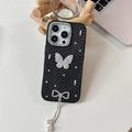Detail of luxury iPhone case with crocodile texture, rhinestones and pearl tassel - Black / 16e