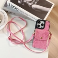 Detail view of pink snakeskin pattern phone case with card holder and crossbody strap - Rose Red