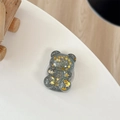 Detail view of a glittery bear phone stand with golden stars and silver sequins - Telescopic Stand Style / Silver Gray