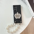 Detail of Galaxy Z Fold case with black crocodile leather, heart mirror, and pearl strap - Snake Pattern Crown Mirror Pearl Chain Black / Samsung ZFlip3