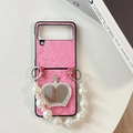 Macro shot of pink crocodile texture phone case with rhinestone crown mirror for Galaxy Z Flip - Snake Pattern Crown Mirror Pearl Chain Rose Red