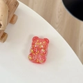 Detail of pink bear phone grip with sparkling gold star sequins on a white table - Telescopic Stand Style / Red