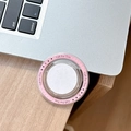 Detailed macro view of a pink circular MagSafe phone stand with Gift For You engraving - Deep Pink