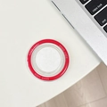 Detail of red magnetic phone grip with Good Luck text on a laptop background - goodluck Magnetic - Adhesive Top / Rose Red