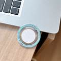Detail of round transparent gift box lid with light blue Gift For You decorative border - Blue