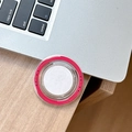 Detail of red magnetic MagSafe phone socket with Gift For You print on wooden desk - Rose Red