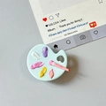 Close-up of artistic mini paint palette phone grip with colorful pigments and brush detail - Transparent Stand Style / Blue