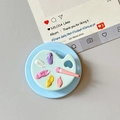 Artistic palette phone socket detail with colorful 3D paint dots and a pink brush - Magnetic Palette Style / Blue
