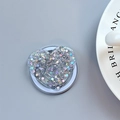 Macro view of heart-shaped glitter phone grip with silver sequins and telescopic base - Magnetic Heart Stand - Light Chasing Silver