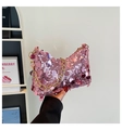 Detail of pink sequin dumpling bag with gold chain strap and shimmering texture surface - Pink