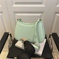 Chic mint green minimalist half-moon shoulder bag with gold metal fashion logo - Green