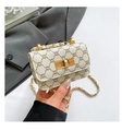 Detail of white monogram chain bag with gold twist lock and grainy leather texture - White