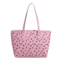 Pink tote bag with cherry print and gold rivets on a minimalist white background - Pink