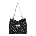 Black tote bag with pink bow prints and white shoulder straps in a minimalist style - Black