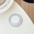Macro view of blue pearl embellished phone grip with strong adhesive backing piece - Light Blue