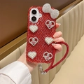 Detail of luxury iPhone case with red rhinestones, silver bow, and pearl hearts - Rhinestone Heart Bow with Lanyard / Red / Series 7/8/SE 2020
