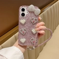 Pink rhinestone iPhone case with 3D crystal bow and pearl hearts and hand chain - Rhinestone Heart Bow with Lanyard / Pink / Series 7/8/SE 2020