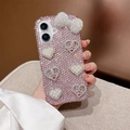Detailed view of pink rhinestone phone case with bow and pearl heart decorations - Rhinestone Heart Bow / Pink / Series 7/8/SE 2020
